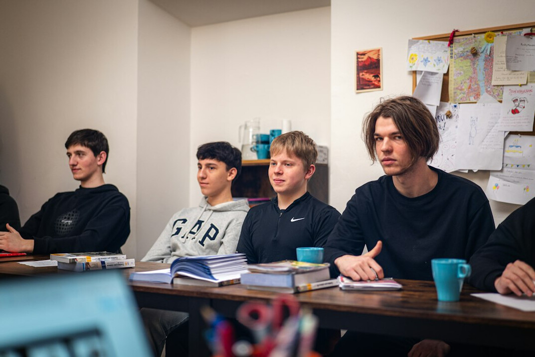 students learning programming in classroom