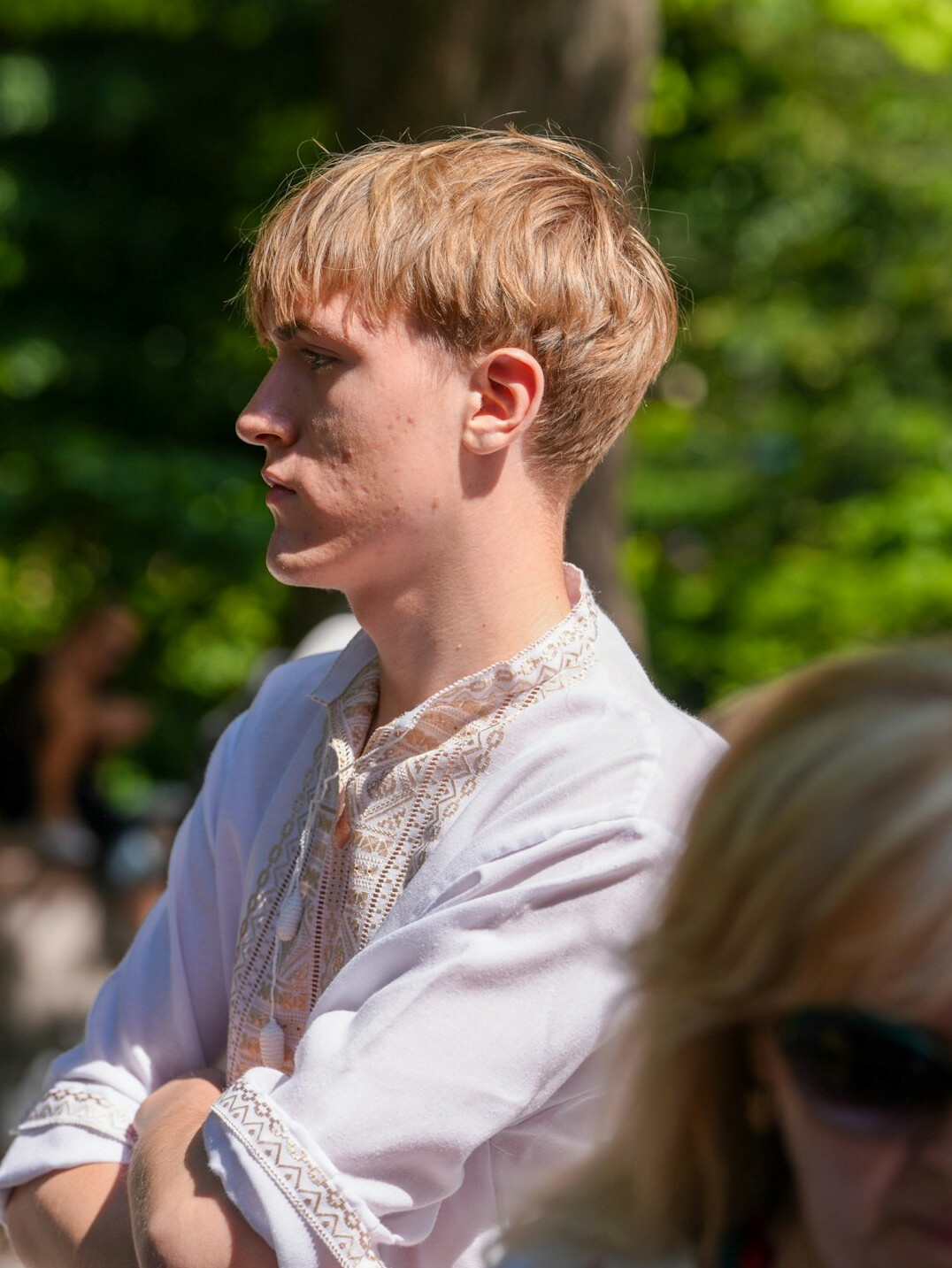 Portrait of a young man in a light shirt