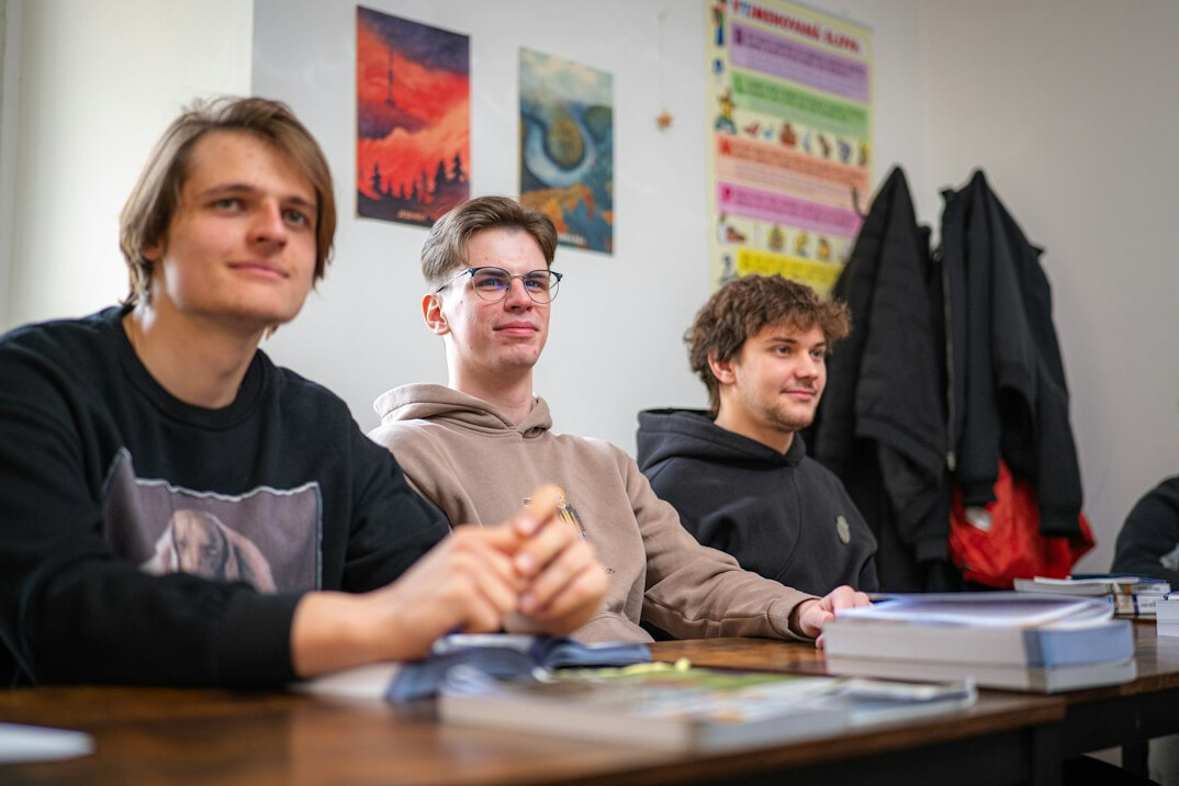 students learning programming in classroom