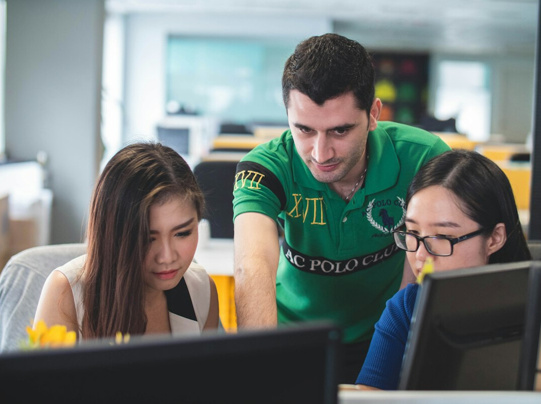 diverse group coding together
